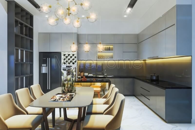 Hệ thống tử bếp dạng chữ L được thiết kế sát vách tường, ốp mặt đá màu đen giúp tiết kiệm không gian phòng